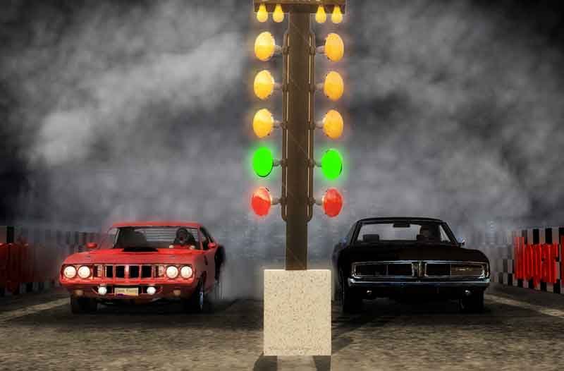 1971 Hemi Cuda and a 1969 Dodge Charger RT face off on the drag strip. Smoking tires