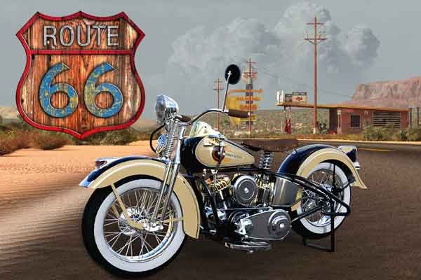 Vintage 1940s Harley Davidson Knucklehead motorcycle in front of an abandoned route 66 desert gas station.